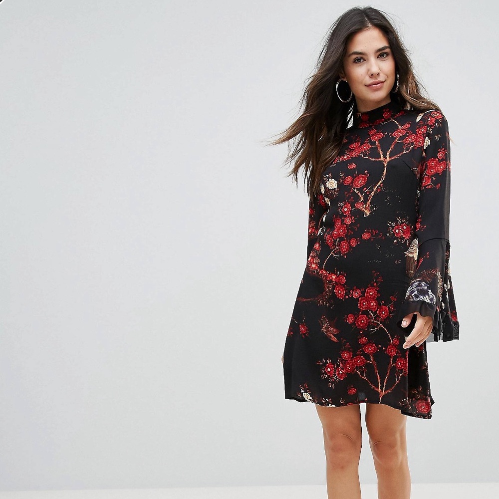 Parisian high neck floral dress with flares